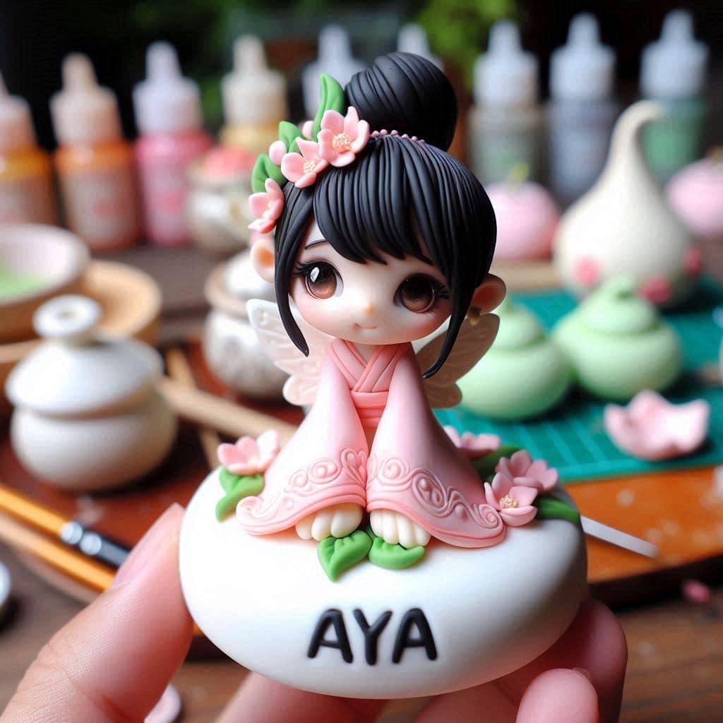 Une figurine en fimo d une petite fille fee orientale personnalise avec le prenom aya
